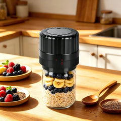 Vacuum sealer for canning jars with a Mason jar filled with oats and fruit